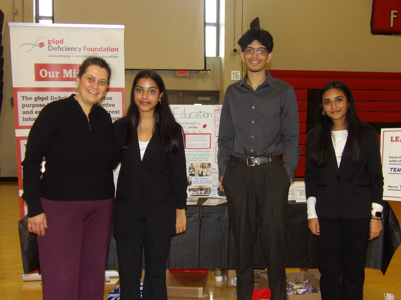Students at the G6PD Deficiency Foundation booth.