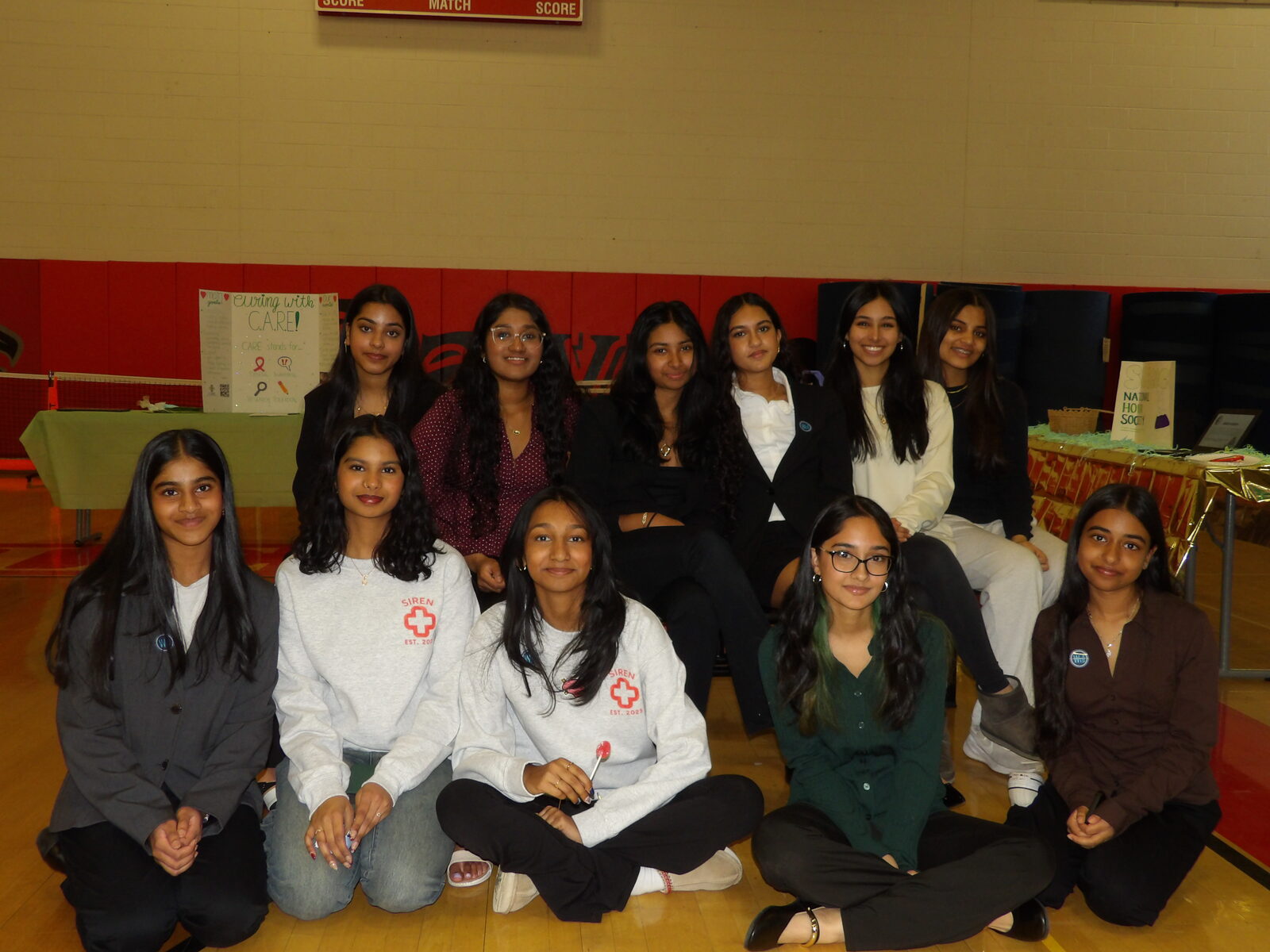 A group of students at the SIREN nonprofit booth.